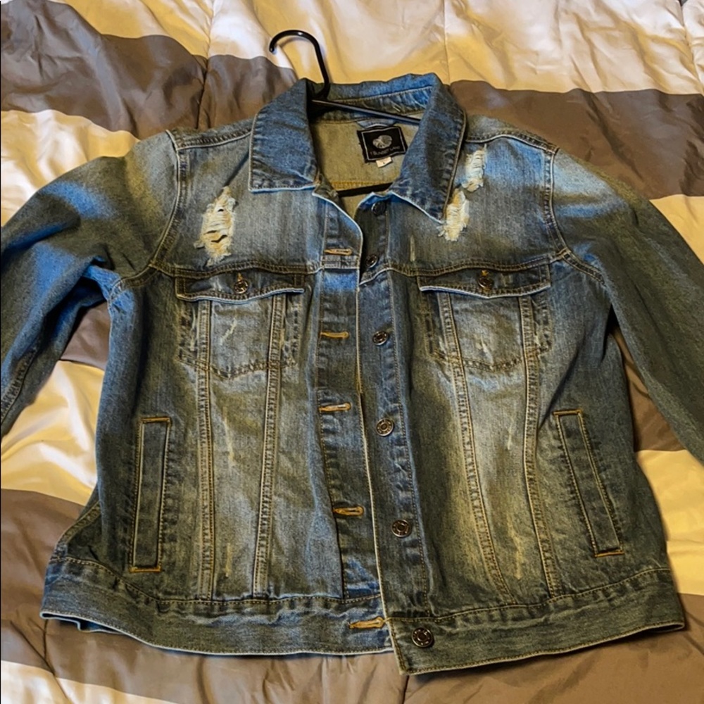 Distressed jean jacket